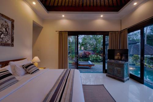 Katil atau katil-katil dalam bilik di Kaja Villa
