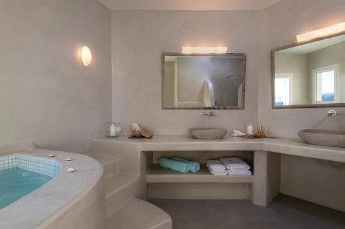 A bathroom at Adamant Suites
