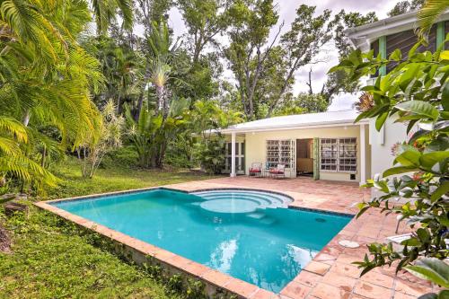 an image of a swimming pool in front of a house at Bright St Thomas Getaway with Pool, 3Mi to Magens Bay in Mafolie