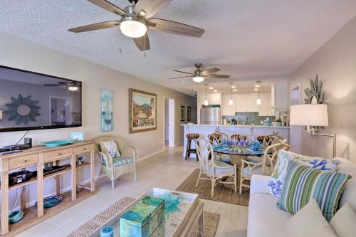 a living room with a dining table and a kitchen at Tropical St Thomas Resort Getaway with Pool Access! in St Thomas