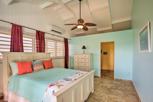 a bedroom with a bed and a ceiling fan at St Croix Home with Caribbean Views - 1 Mi to Beach in La Vallee