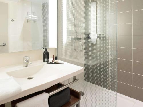 Un baño de Aparthotel Adagio Toulouse Centre Ramblas