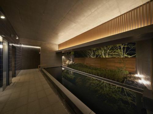 an external view of a building with a garden at Resol no Mori in Nagara