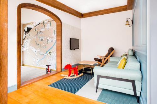 Cama o camas de una habitación en CandyFloss 棉花糖民宿 遊高雄