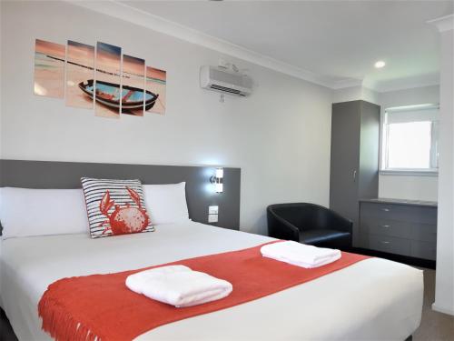 Econo Lodge Chaparral Motel Ballinaにあるベッド