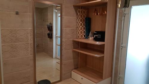 a bathroom with a shower and a walk in shower at 154 Pearl Beach in Mahabalipuram