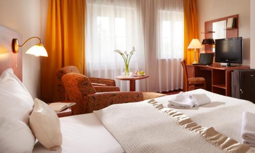 Katil atau katil-katil dalam bilik di Spa Resort PAWLIK-AQUAFORUM