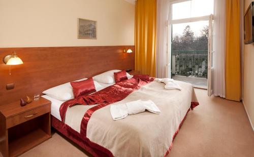 Katil atau katil-katil dalam bilik di Spa Resort PAWLIK-AQUAFORUM