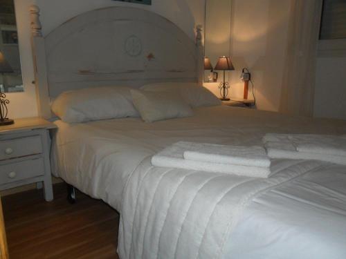 Voodi või voodid majutusasutuse Casa Oasis toas