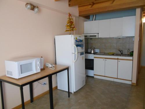 Una cocina o kitchenette en Choconcito Apart Hotel