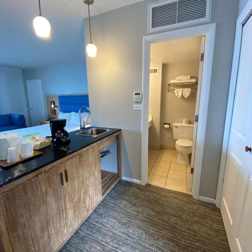 a bathroom with a sink and a toilet at Royal Kona Resort in Kailua-Kona