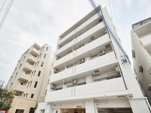 an image of an apartment building at M´s Stay Okinawa in Chatan