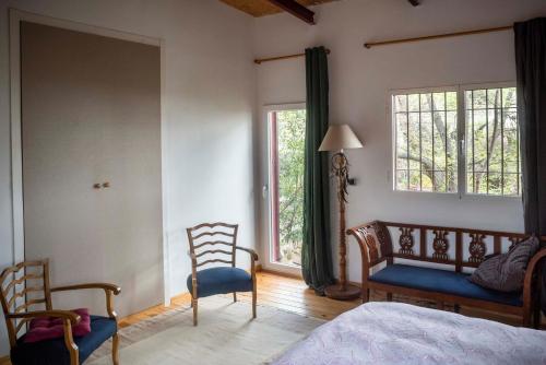 Ένα ή περισσότερα κρεβάτια σε δωμάτιο στο Casita en La Sierra