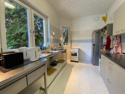 a kitchen with a sink and a counter top at W.I.P. Welt im Park in Dresden