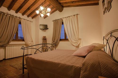 Krevet ili kreveti u jedinici u okviru objekta Agriturismo Casa al Povero