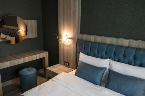 Postel nebo postele na pokoji v ubytování CABA HOTEL &SPA