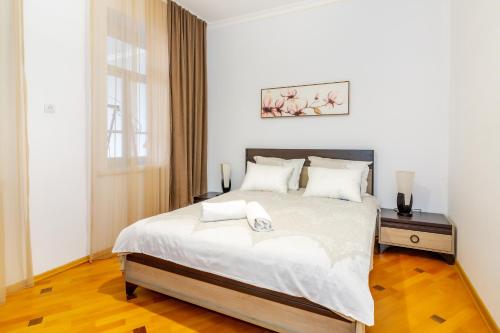 Кровать или кровати в номере Guesthouse Alvani