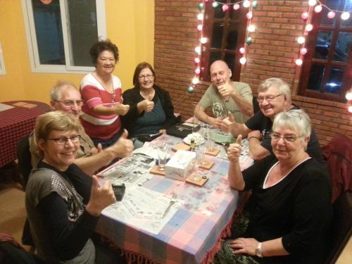 a group of people sitting around a table at Jansupar Court in Chiang Rai