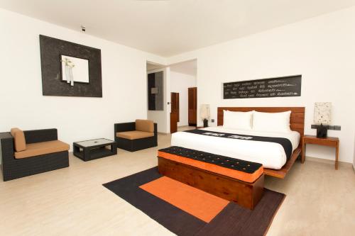 
A bed or beds in a room at Aliya Resort and Spa
