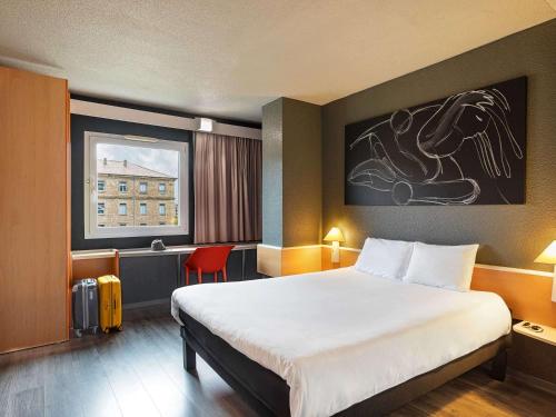 Postel nebo postele na pokoji v ubytování Ibis Salamanca