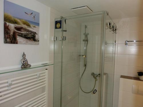 Ванная комната в Fewo Neptun im Landhaus Immenbarg