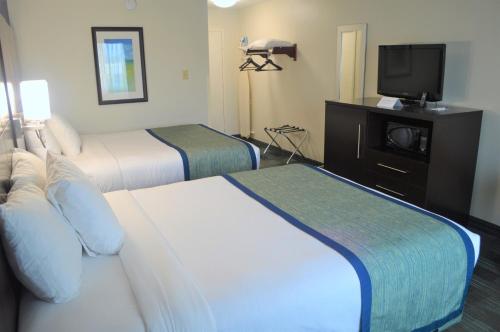 Katil atau katil-katil dalam bilik di Falmouth Inn