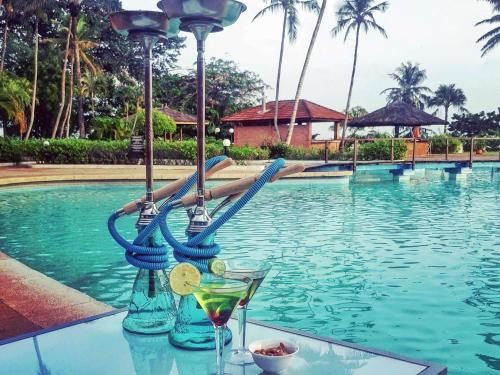 Bazén v ubytování Sofitel Abidjan Hotel Ivoire nebo v jeho okolí