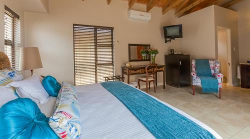 Postel nebo postele na pokoji v ubytování Relax Inn