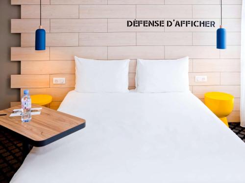 Кровать или кровати в номере ibis Styles Chalons en Champagne Centre