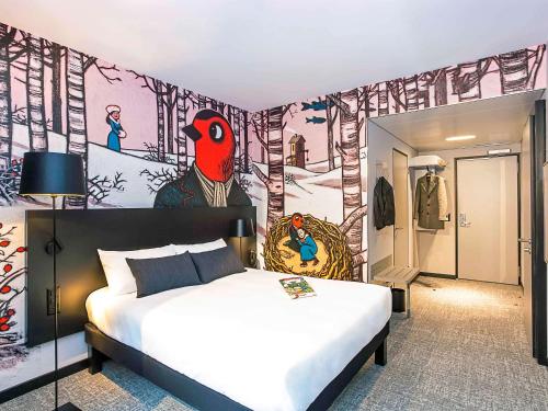 Uma cama ou camas num quarto em ibis Styles Genève Carouge