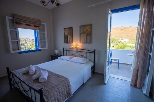 Un ou plusieurs lits dans un hébergement de l'établissement Meltemi Hotel Kythnos