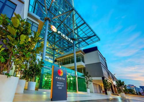 a building with a sign in front of it at 1-2 Guests, Cybersquare Private Studio - Cyberjaya, Flexihome-MY in Cyberjaya