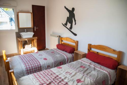 Postel nebo postele na pokoji v ubytování Les gîtes d'Aure