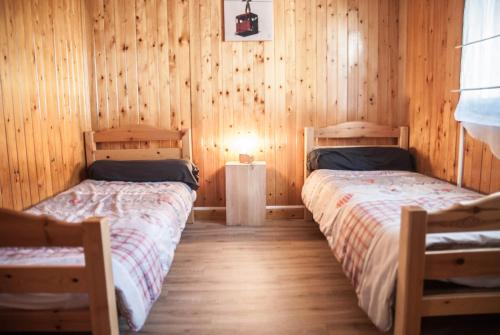 Postel nebo postele na pokoji v ubytování Les gîtes d'Aure
