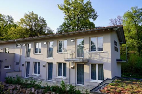 an exterior view of a building with a balcony at Busses Guesthouse in Freiburg im Breisgau