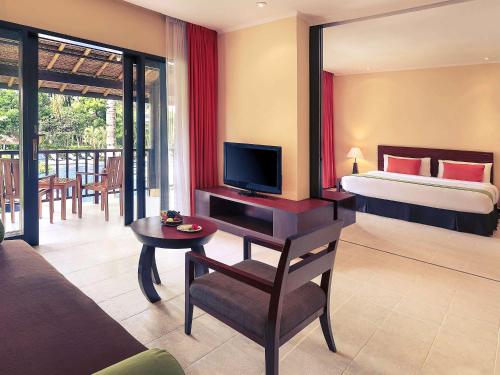 A television and/or entertainment centre at Mercure Resort Sanur