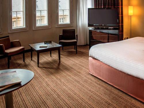 Postel nebo postele na pokoji v ubytování Ibis Styles Metz Centre Gare