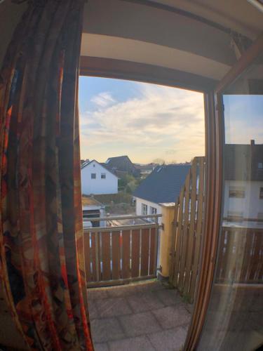 a view from a window of a balcony at Apartment Hotel Seebach in Großenseebach