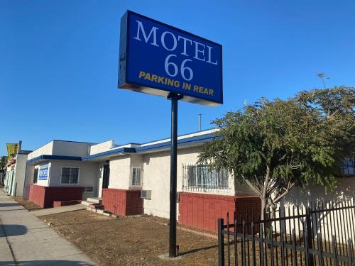 a motel sign in front of a building at Motel 66 Los Angeles in Los Angeles