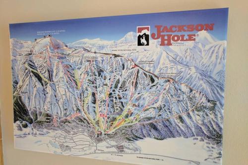 a map of jackson hole on a wall at Beautiful Mountain Condo in Wilson
