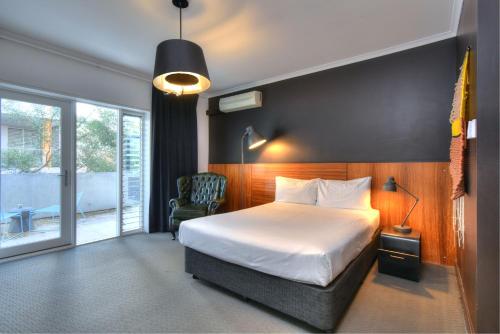 Ένα ή περισσότερα κρεβάτια σε δωμάτιο στο Riverview on Mount Street