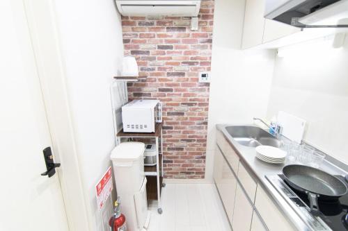 ルマイン六郷土手にあるキッチンまたは簡易キッチン