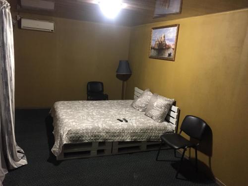 Postel nebo postele na pokoji v ubytování Мотельный комплекс Телега