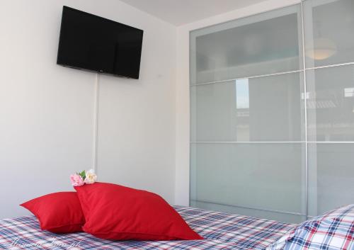 A bed or beds in a room at La Casa di MaPi
