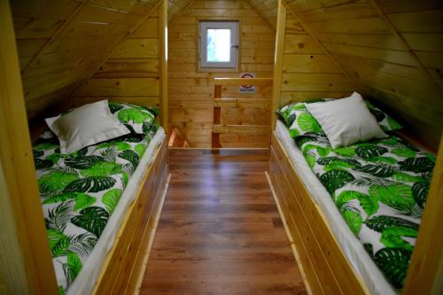 Llit o llits en una habitació de Siedlik Agroturystyka - spokojne miejsce dla Ciebie i Twojej rodziny