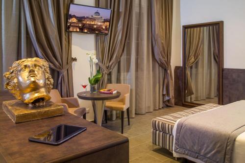 Postel nebo postele na pokoji v ubytování Hearth Hotel