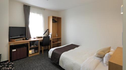 Μια τηλεόραση ή/και κέντρο ψυχαγωγίας στο Hotel Annex Inn