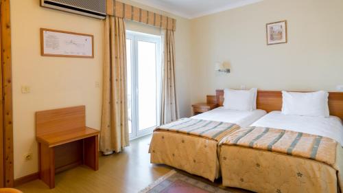 Katil atau katil-katil dalam bilik di Hotel Belsol