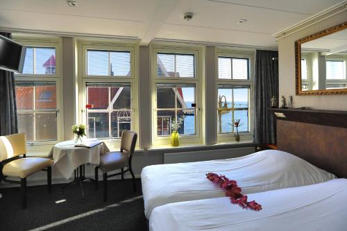 Postel nebo postele na pokoji v ubytování Hotel Cafe Restaurant Van Den Hogen