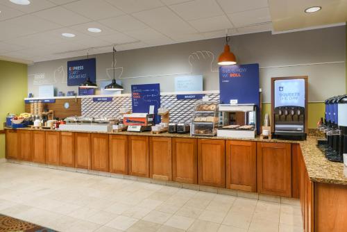a fast food counter in a store with a food at Holiday Inn Express Boston Brockton by IHG in Brockton